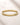 ENVYONE 18K Gold-Plated stainless steel contoured bangle displayed on a beige stone surface.