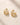ENVYONE 18K Gold Plated stainless steel hoop earrings featuring a polished sculptural design.