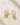 ENVYONE 18K Gold Plated huggie hoop earrings featuring baguette-cut and round zircon stones, displayed on a light beige stone surface.