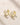 ENVYONE 18K Gold Plated zircon hoop earrings with a polished finish and alternating baguette and round stone detailing.