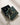 ENVYONE 925 Sterling Silver leaf earrings with sparkling cubic zirconia stones, displayed in an open signature dark green jewellery box with black velvet interior, gold branding and matching ENVYONE ribbon.