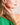 Woman wearing ENVYONE 18K Gold-Plated stud earrings featuring emerald-cut green zircon gemstones.