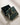 ENVYONE green gemstone stud earrings presented in an open signature dark green jewellery gift box, with branded packaging and ribbon on a light textured surface.