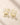 18K Gold Plated Earrings with sparkling square cut and round zircon stones, displayed on a light beige stone surface.