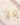 ENVYONE gold statement earrings shown at an angle, featuring square-cut zircon stones and pavé zircon detailing on a neutral stone background.