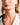 Closeup of a woman wearing ENVYONE 18K Gold-Plated stainless steel hoop earrings