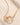 Closeup of an ENVYONE 18K Gold Plated necklace with polished interlocking links and a delicate gold chain.