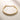ENVYONE 18K Gold Plated stainless steel collar necklace with a bold rounded design displayed on textured beige stone.