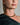 Closeup of an ENVYONE 18K Gold Plated stainless steel collar necklace worn high around a woman’s neckline.