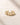 Closeup of an ENVYONE adjustable 18K Gold-Plated stainless steel ring featuring interwoven curved bands.