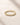 ENVYONE 18K Gold Plated zircon eternity ring featuring round white stones in detailed textured settings.